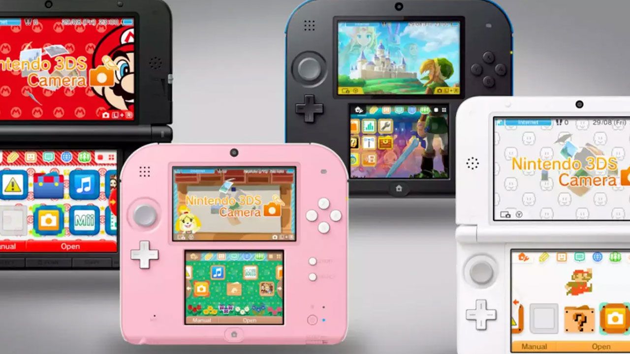 Consolas portátiles Nintendo 3DS en color negro y blanco junto a modelos Nintendo 2DS de una sola pieza en colores rosa y negro.